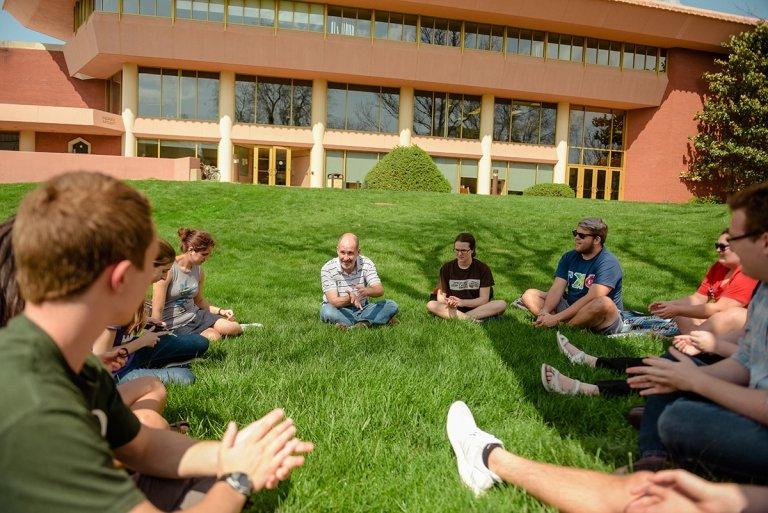 Music class meeting on the lawn of Grant Hall